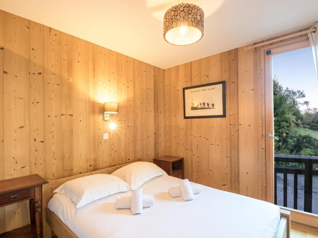 Posteľ alebo postele v izbe v ubytovaní Chalet charmant avec sauna, WiFi et parking à Chamonix - FR-1-343-232