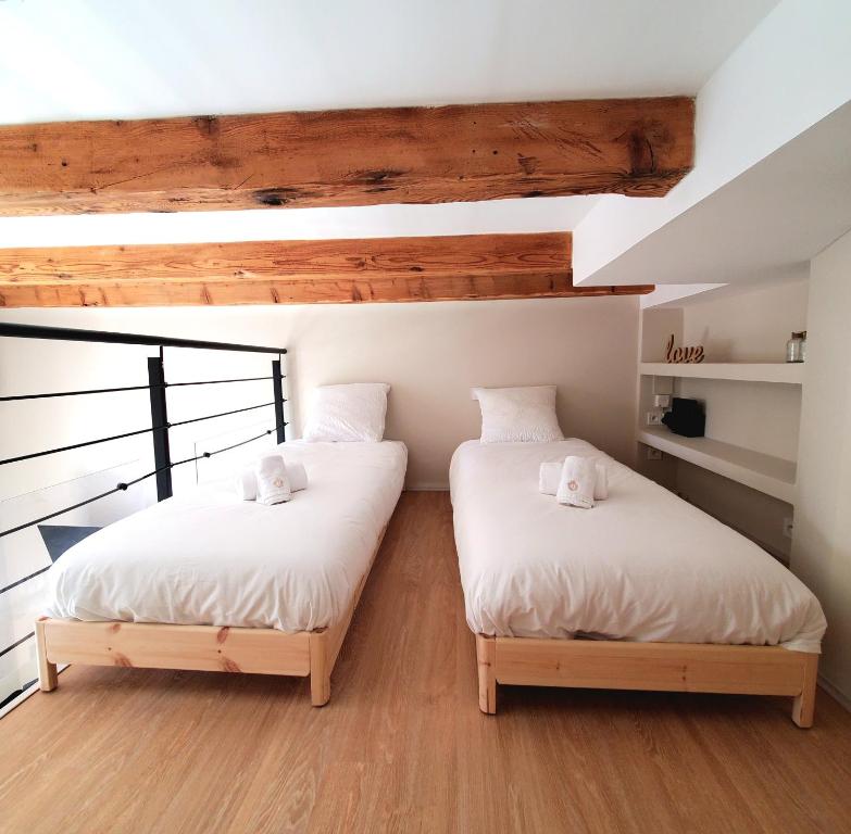 Ένα ή περισσότερα κρεβάτια σε δωμάτιο στο Bioves - Mezzanine studio, Charming & Comfortable