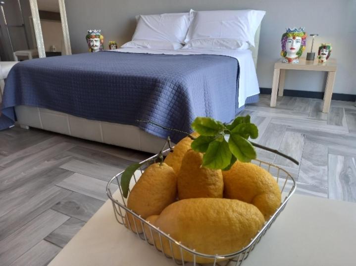 A bed or beds in a room at Sicily Etna House