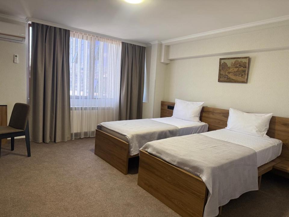 Postel nebo postele na pokoji v ubytování Shirak Hotel