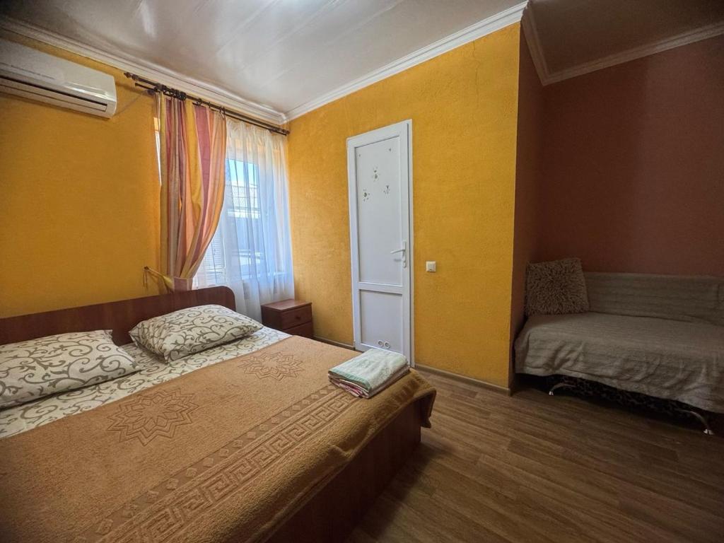 Postel nebo postele na pokoji v ubytování Domik na Fontane