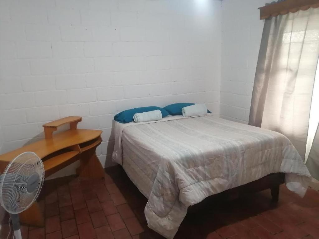 Postel nebo postele na pokoji v ubytování Coco Beach House