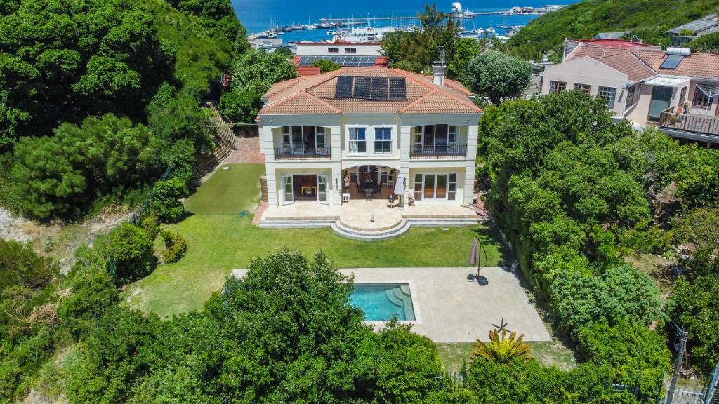 an aerial view of a house with a swimming pool at Luxury Family Villa Near Beach with Grill and Workspace in Cape Town