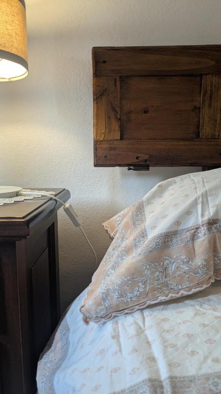 Postel nebo postele na pokoji v ubytování B&B Ginestra