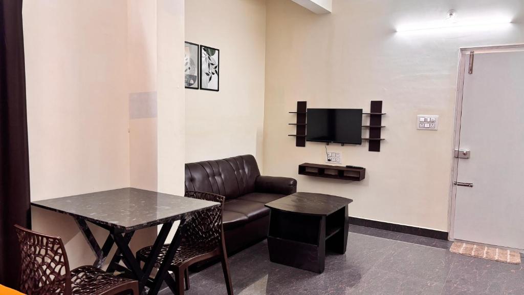 TV a/nebo společenská místnost v ubytování Samuels Comfort Homes