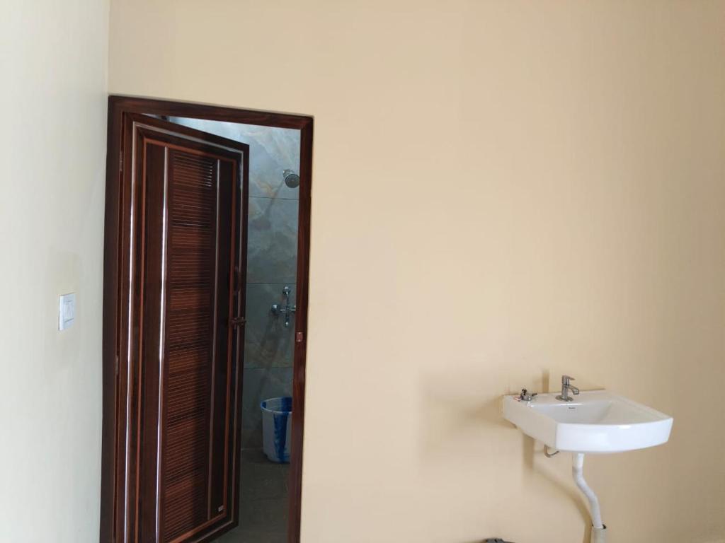 Koupelna v ubytování Jayanthi home stay