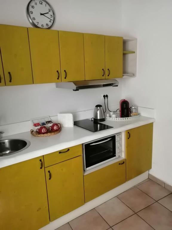 Kuchyňa alebo kuchynka v ubytovaní Porta Mazzini Affittacamere
