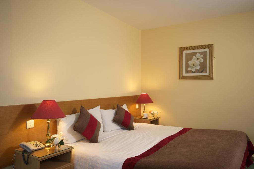 Letto o letti in una camera di Murphys of Killarney