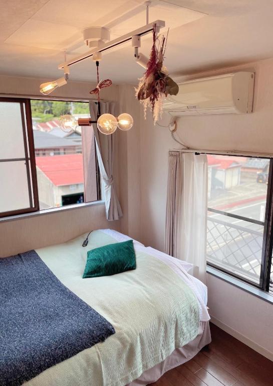Cama o camas de una habitación en 民泊宿 i s e s h i m a 伊勢内宮前203
