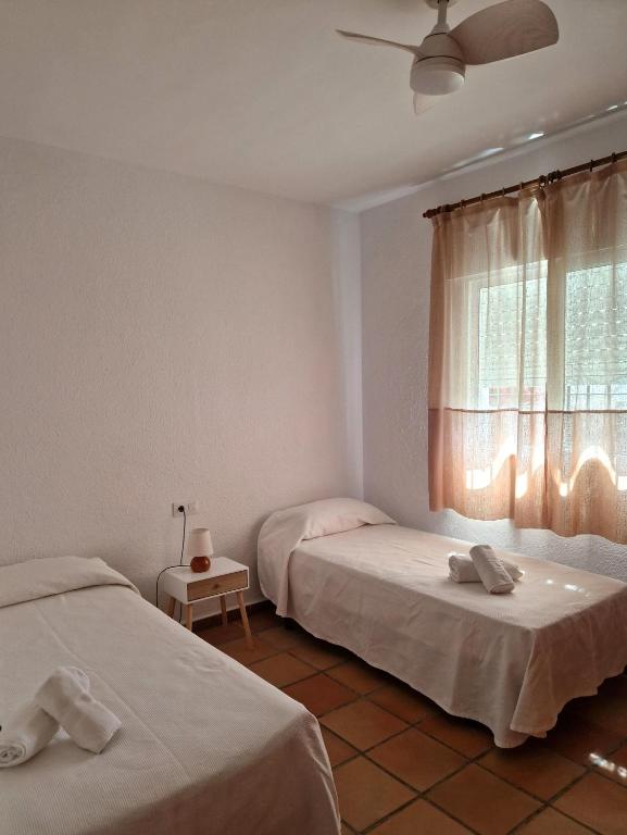 Posteľ alebo postele v izbe v ubytovaní Las Casas de Las Flores
