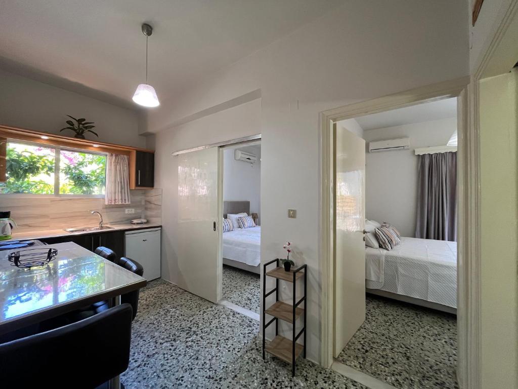 Letto o letti in una camera di Nikos Studios