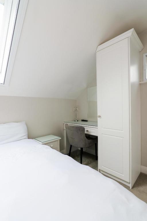 Postel nebo postele na pokoji v ubytování Sea Mist Guesthouse