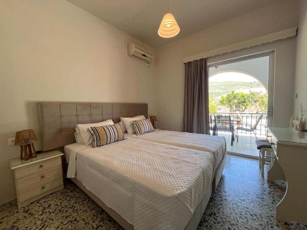 Letto o letti in una camera di Nikos Studios