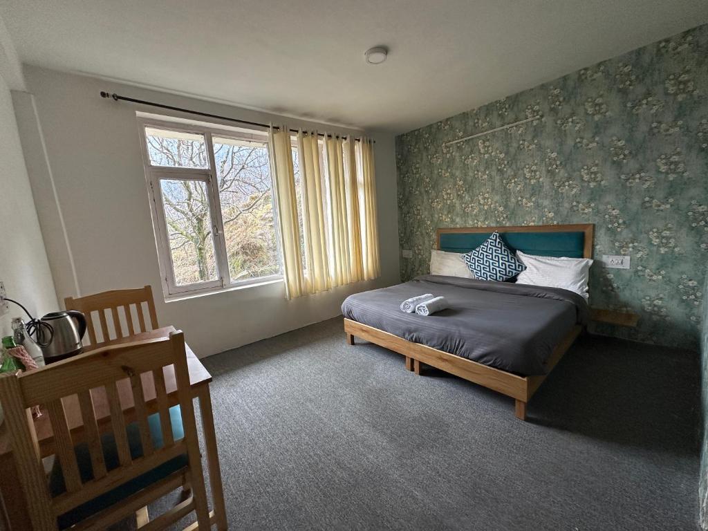 Postel nebo postele na pokoji v ubytování La Heim Hostels