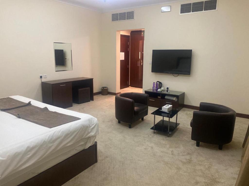 TV a/nebo společenská místnost v ubytování A Line Hotel