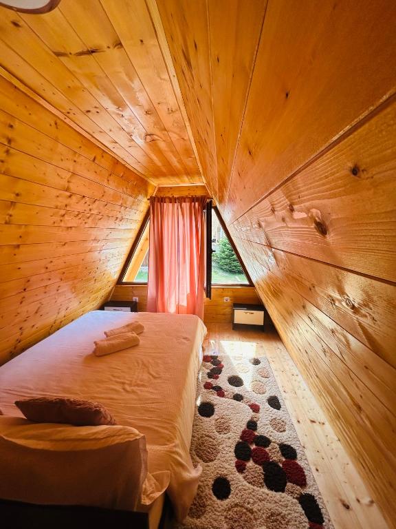 Postel nebo postele na pokoji v ubytování Casa Ursu