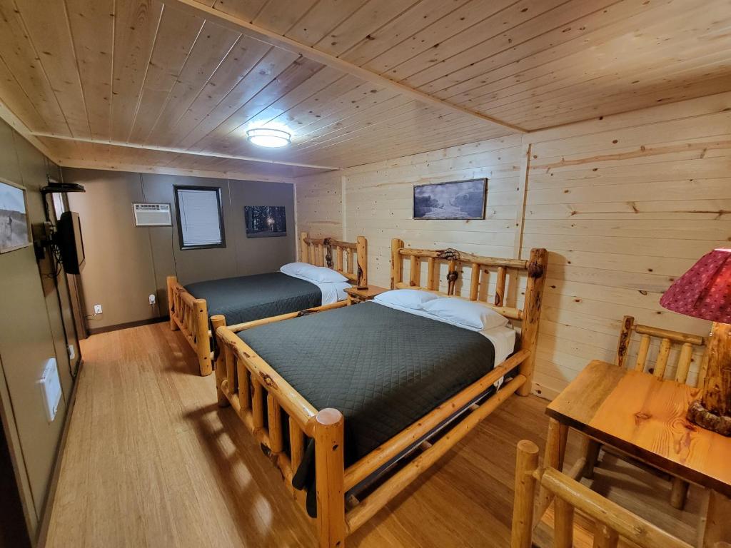 Postel nebo postele na pokoji v ubytování Crescent motel