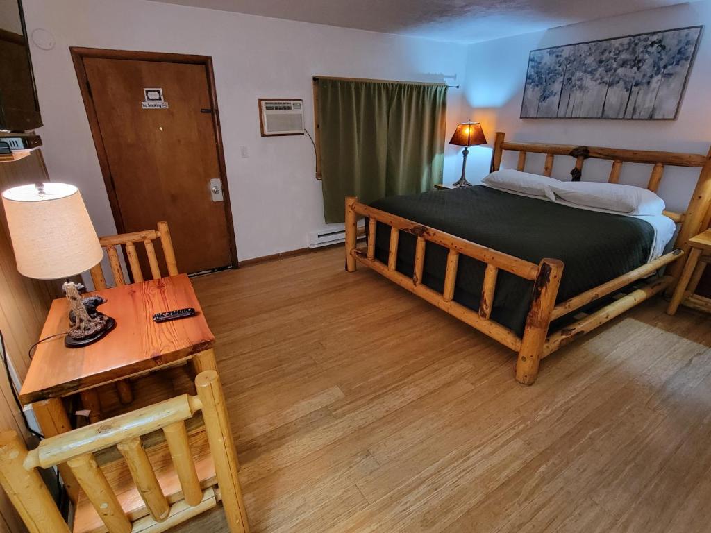 Postel nebo postele na pokoji v ubytování Crescent motel