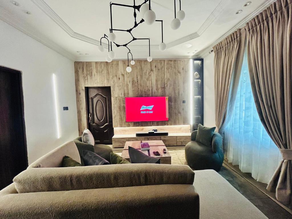 TV a/nebo společenská místnost v ubytování Go flex Studios