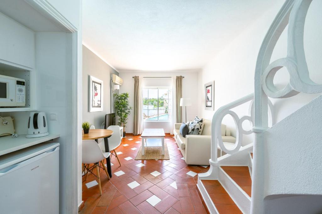 Гостиная зона в Baluarte da Vila Apartments