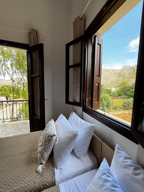 Ένα ή περισσότερα κρεβάτια σε δωμάτιο στο Amelia's Home