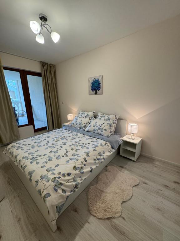 En eller flere senge i et værelse på South Bay Beach