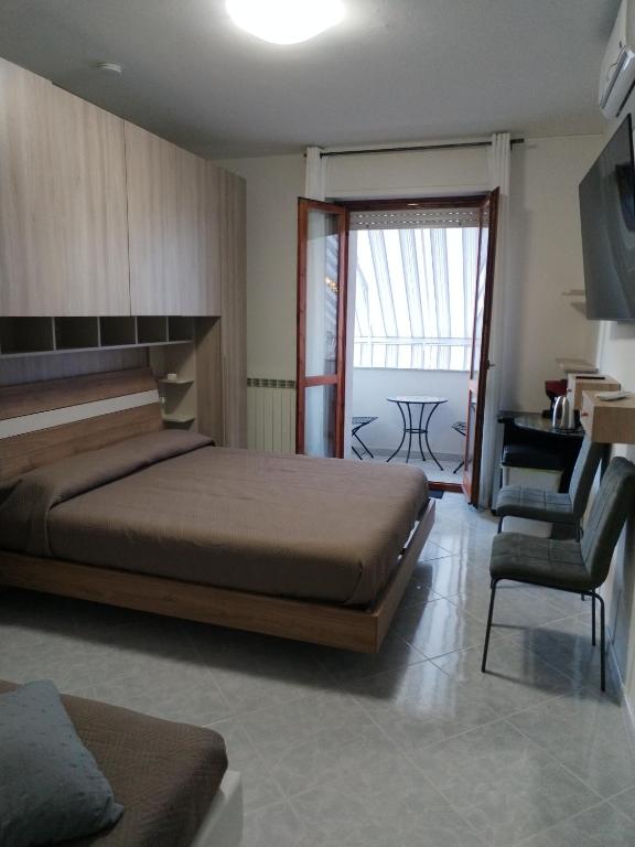Postel nebo postele na pokoji v ubytování RIU b&b ALGHERO