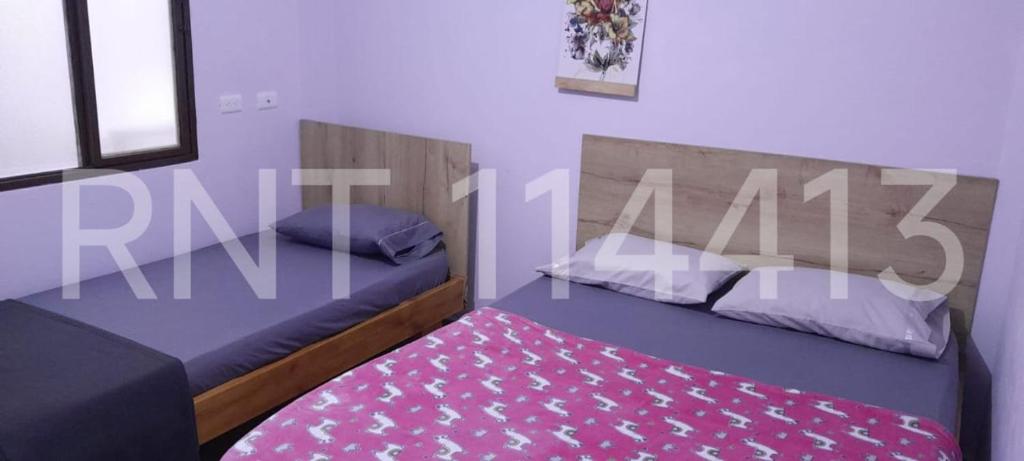 Postel nebo postele na pokoji v ubytování Apartamento Nómadas