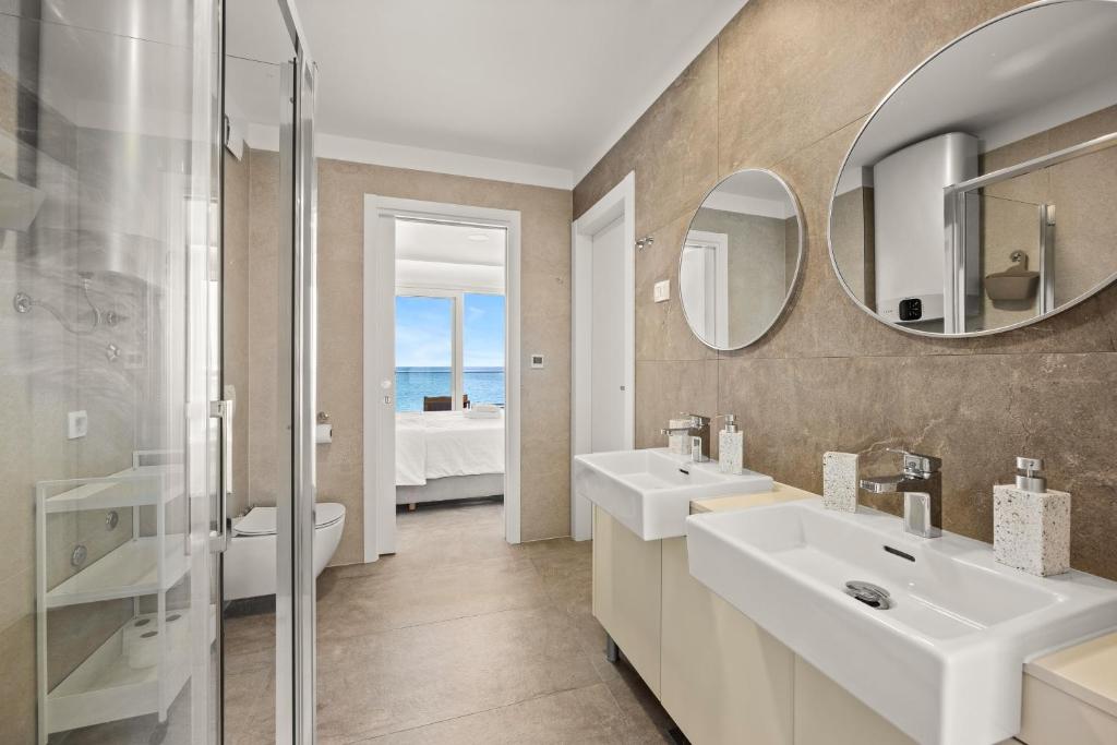 Koupelna v ubytování Calypso Residence