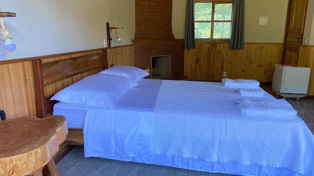 Postel nebo postele na pokoji v ubytování Pousada Algama