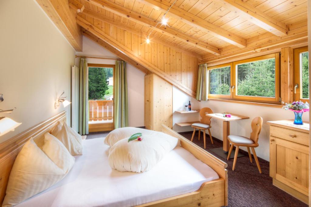 Postel nebo postele na pokoji v ubytování Hotel Wieslhof
