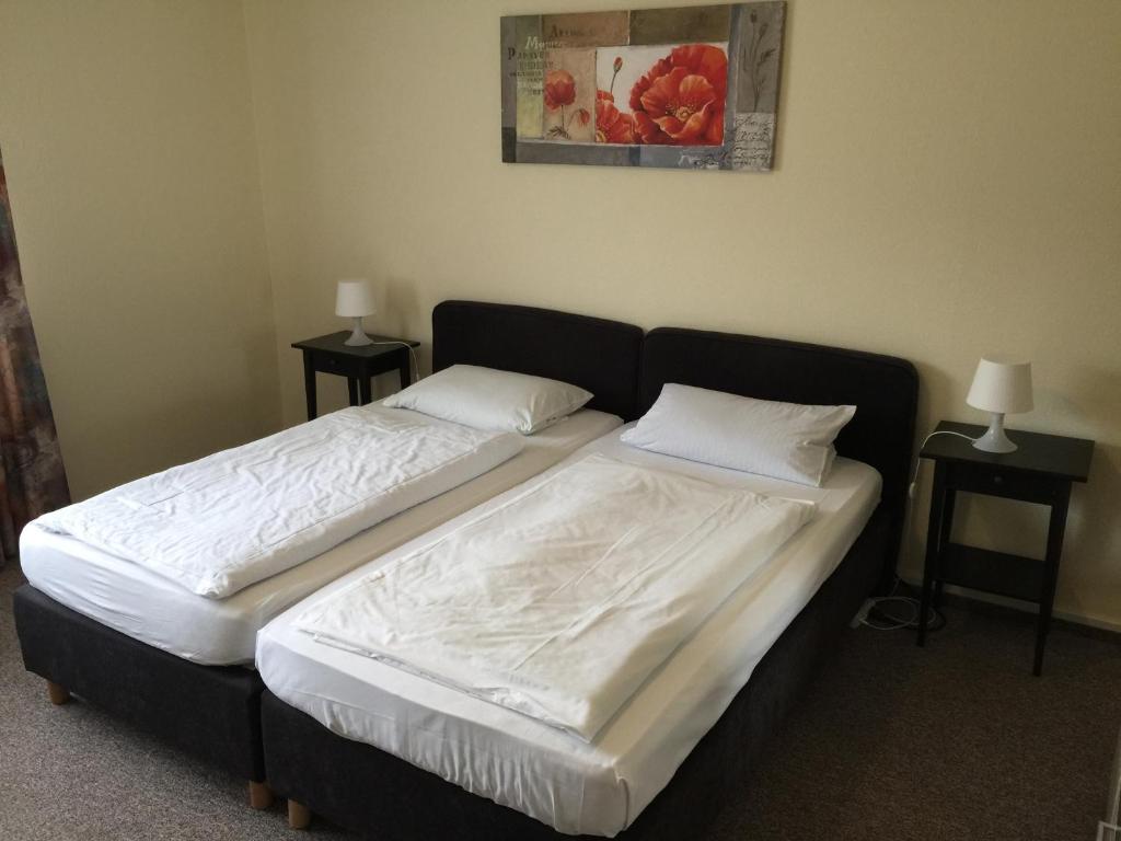 Postel nebo postele na pokoji v ubytování Hotel Gasthof am Waldeck
