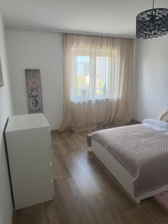 En eller flere senge i et værelse på Apartament OGRODOWA 9 - Old Town - MTP