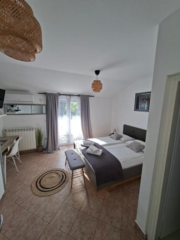 Postel nebo postele na pokoji v ubytování Martina Guest house