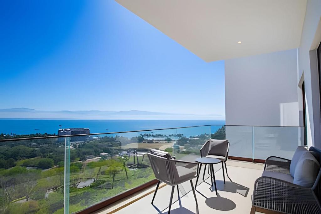a living room with a view of the ocean at Alamar Vallarta vta in Cruz de Huanacaxtle
