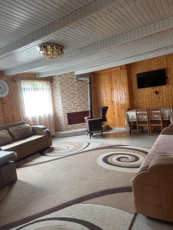 TV a/nebo společenská místnost v ubytování Guest House Noe