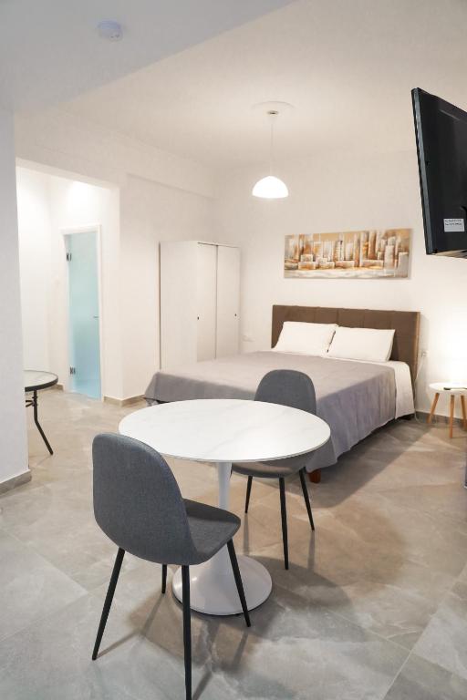 A bed or beds in a room at Old Town Studios, Corfu