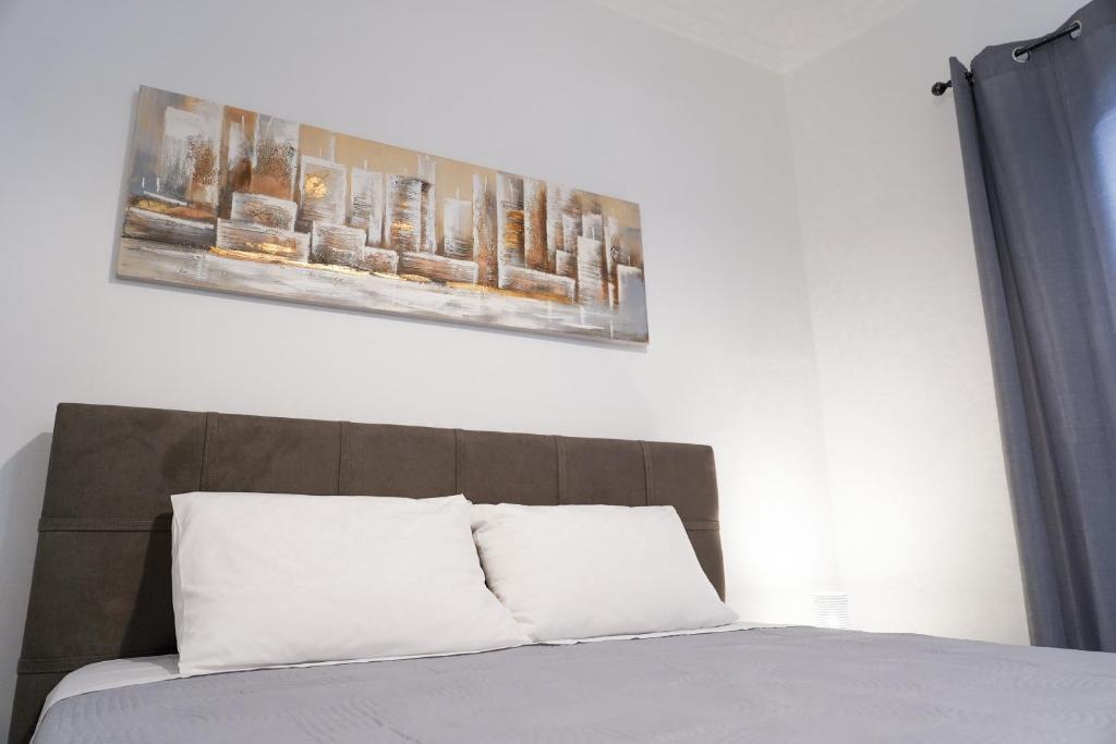 A bed or beds in a room at Old Town Studios, Corfu