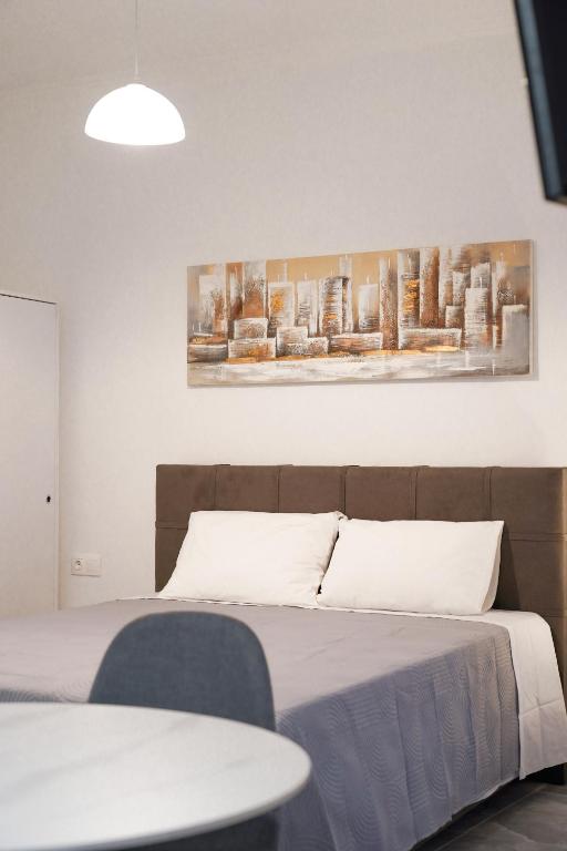 A bed or beds in a room at Old Town Studios, Corfu