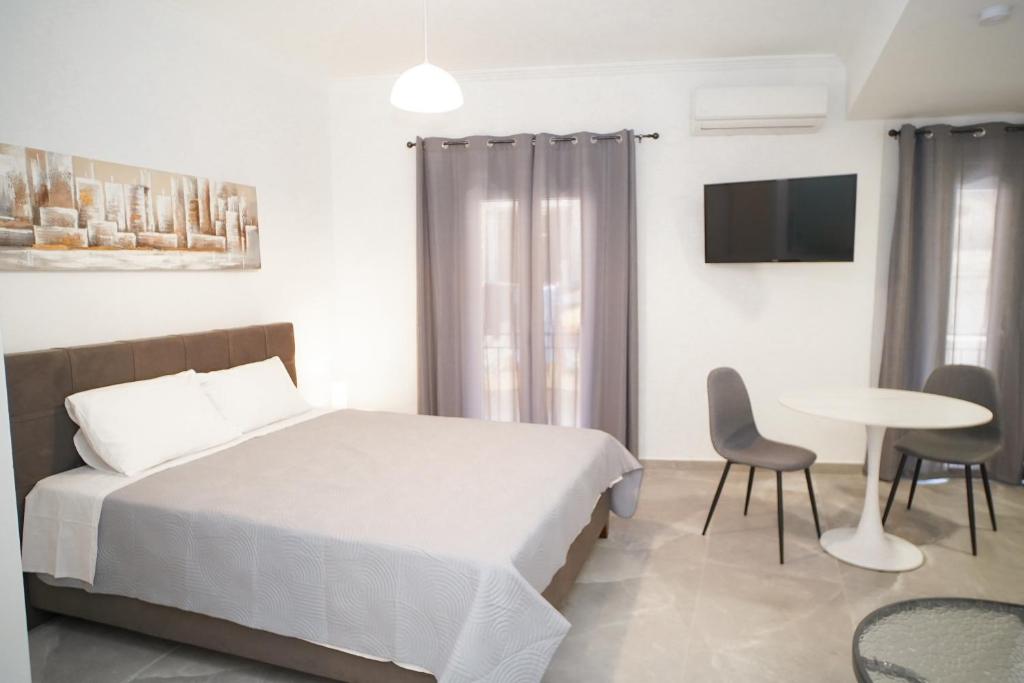 A bed or beds in a room at Old Town Studios, Corfu