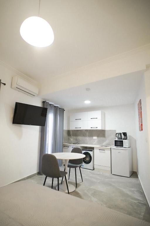A kitchen or kitchenette at Old Town Studios, Corfu