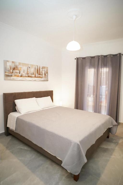 A bed or beds in a room at Old Town Studios, Corfu