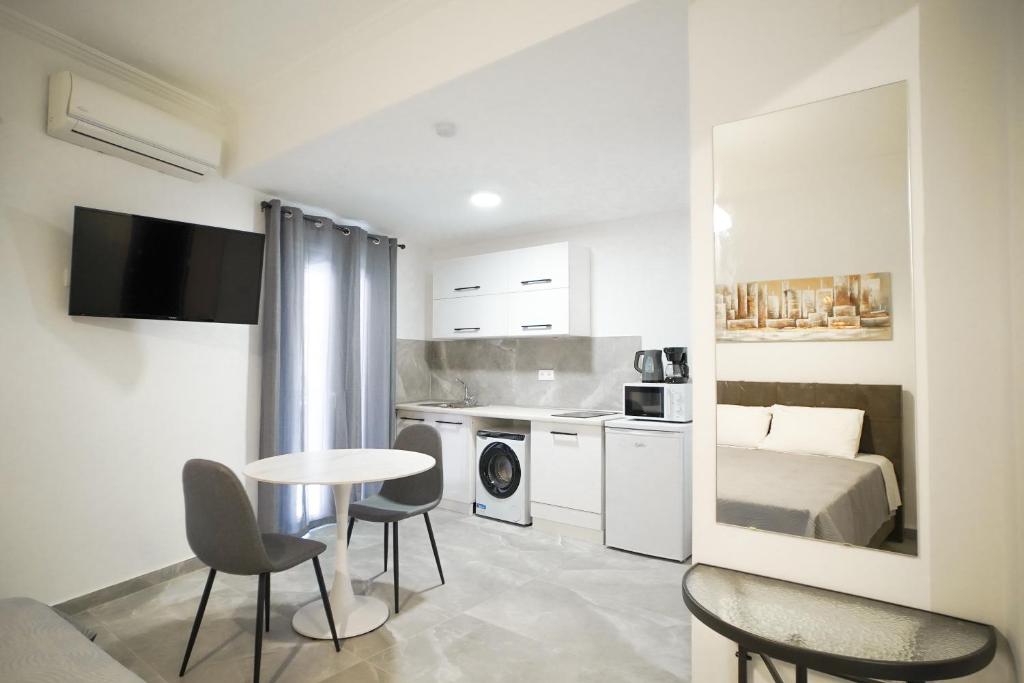 A kitchen or kitchenette at Old Town Studios, Corfu