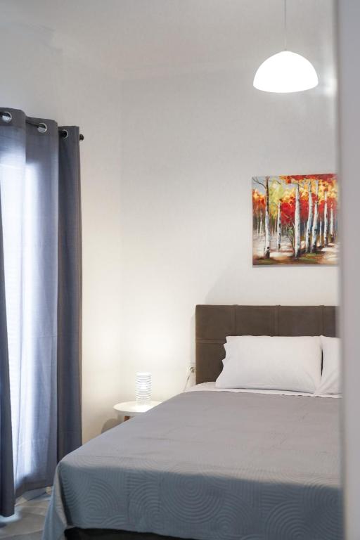 A bed or beds in a room at Old Town Studios, Corfu