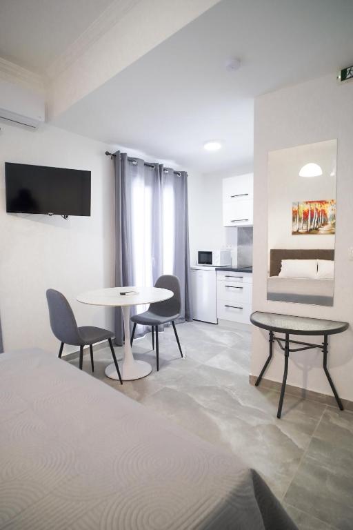 A television and/or entertainment centre at Old Town Studios, Corfu