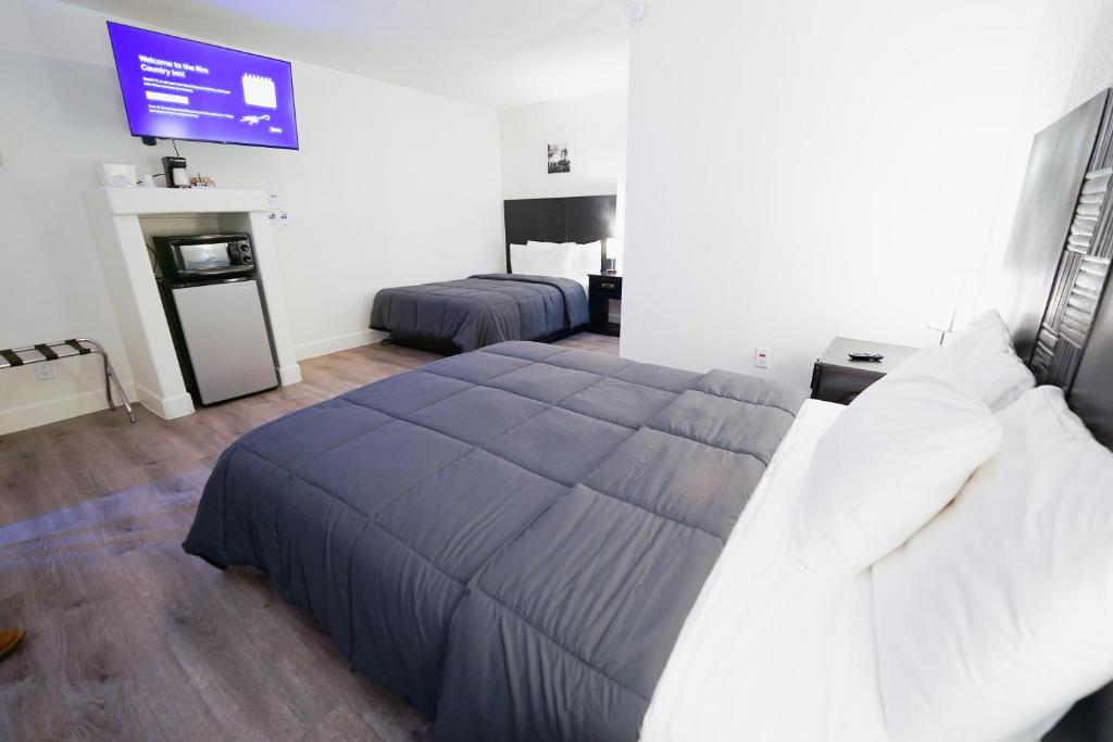 Postel nebo postele na pokoji v ubytování Rim Country Inn Payson