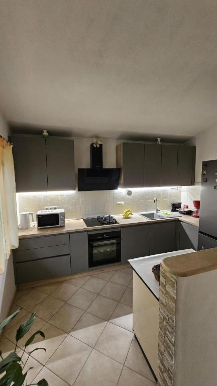 Kuchyň nebo kuchyňský kout v ubytování Villa Katja