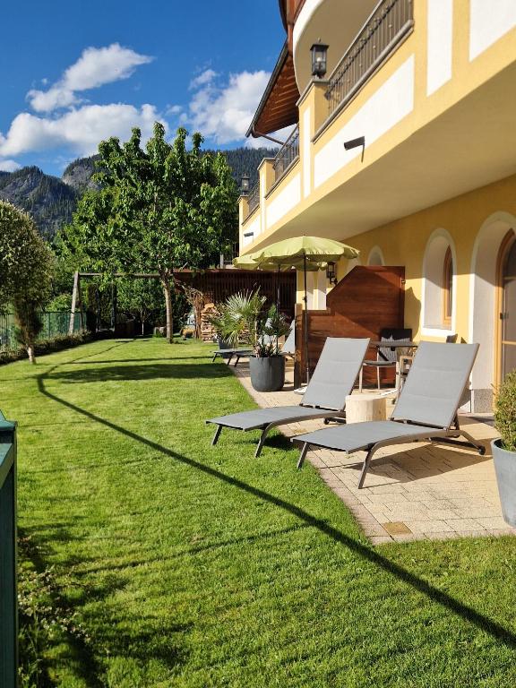 A garden outside Appartementhaus Unterkofler