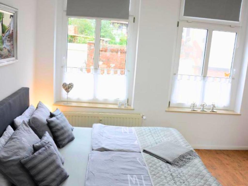 Ένα ή περισσότερα κρεβάτια σε δωμάτιο στο Harzvorland-Auszeit für 2 & Hund & Natur inklusive