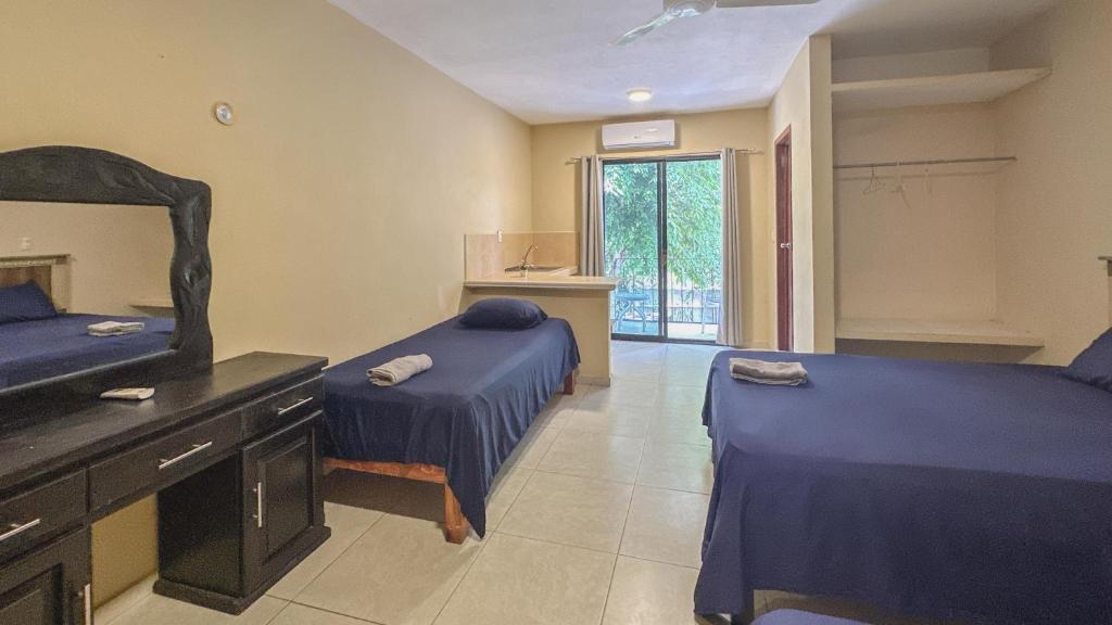 Postel nebo postele na pokoji v ubytování Casa Daniels Guesthouse